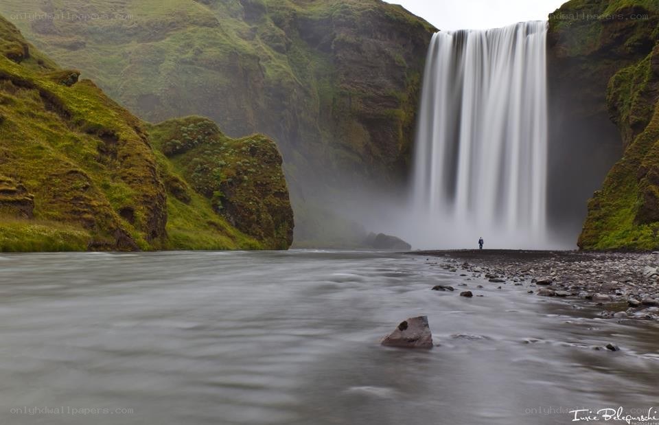 Waterfall in a green canyon