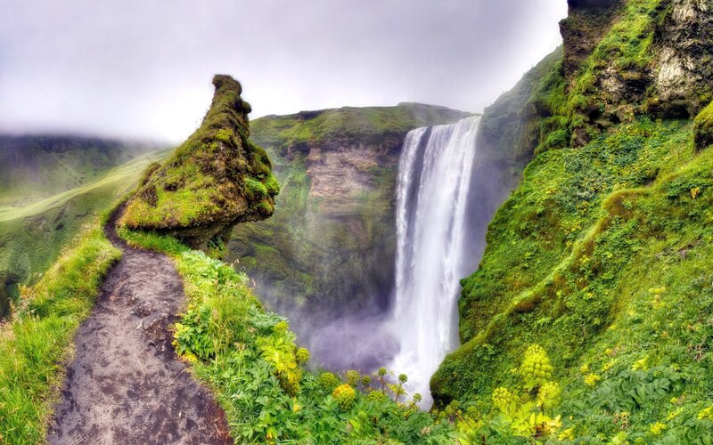 Waterfall in a green canyon