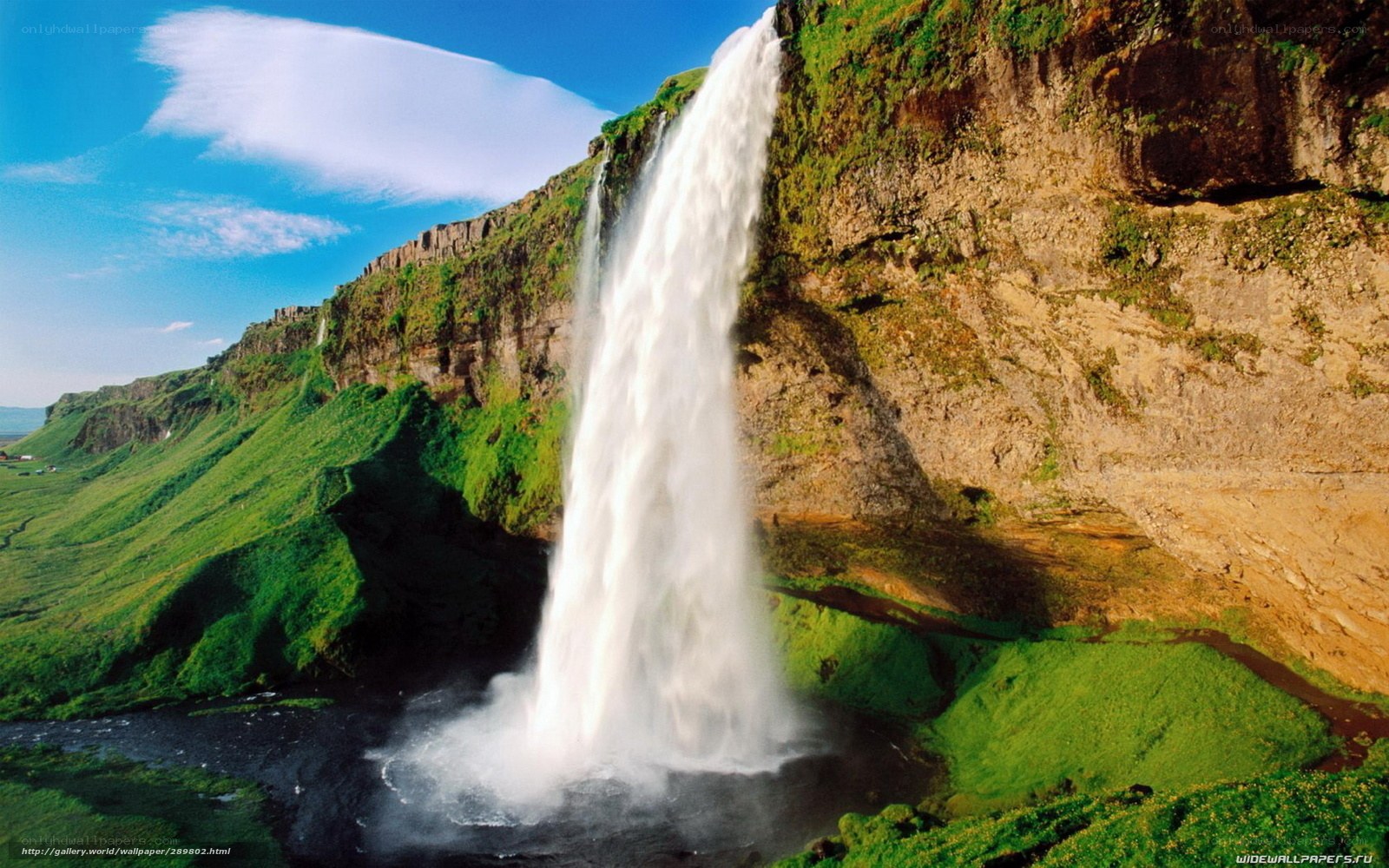 Waterfall in a green landscape