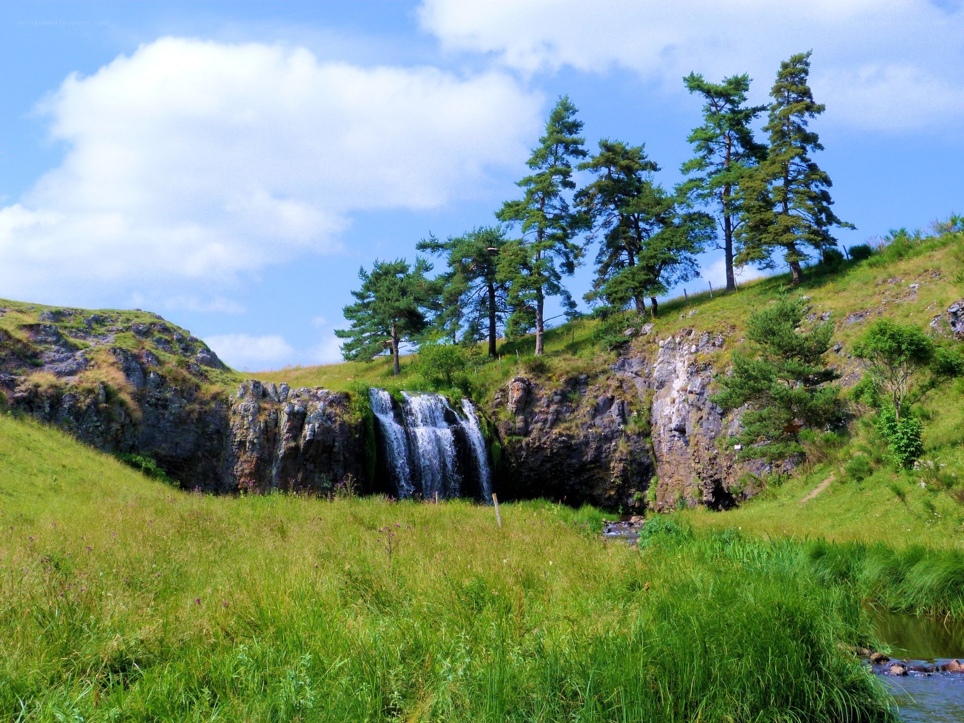 Waterfall in a green valley