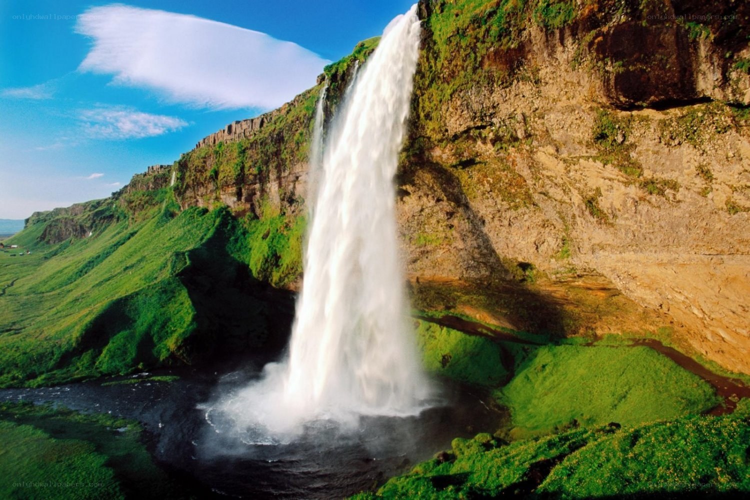 Waterfall in a green valley