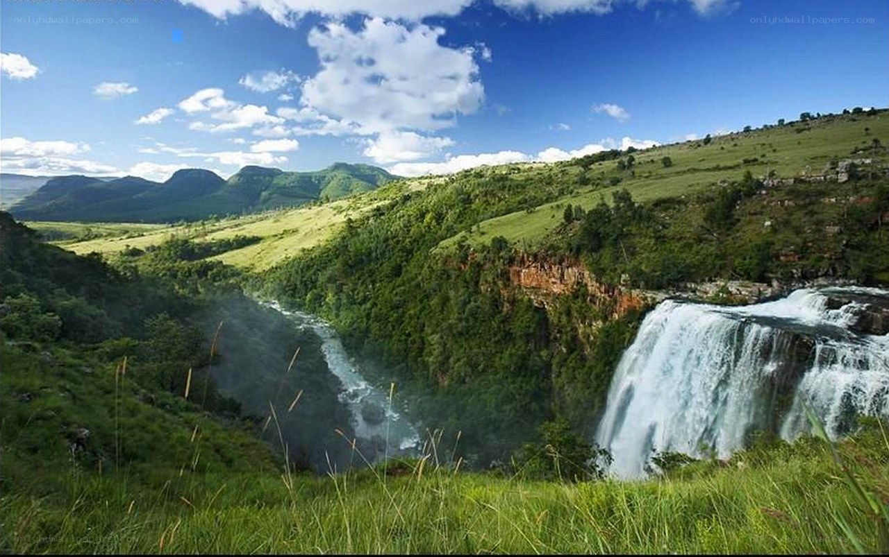 Waterfall in a green valley