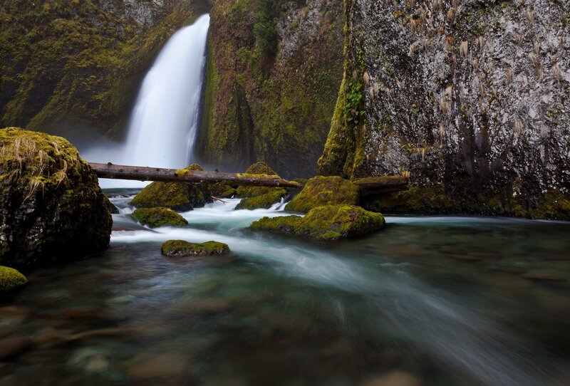 Waterfall in a mossy canyon