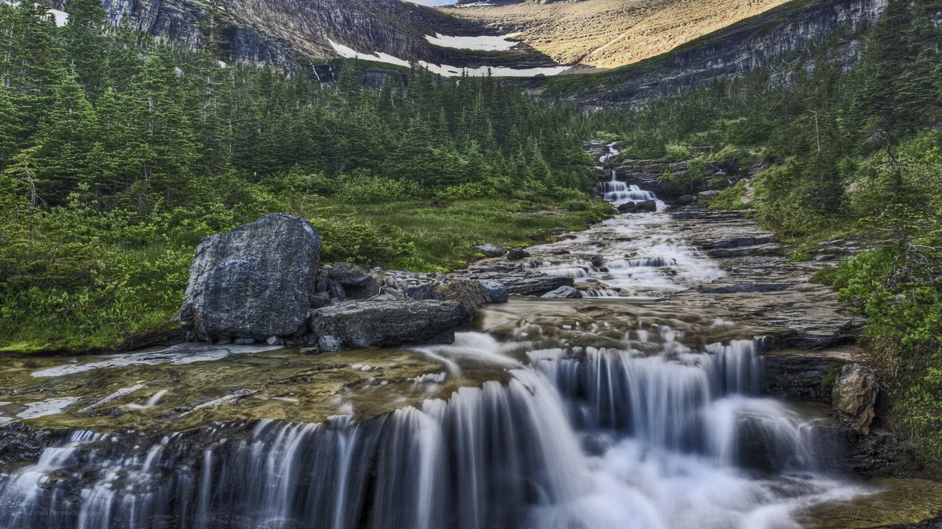 Waterfall in a mountain valley