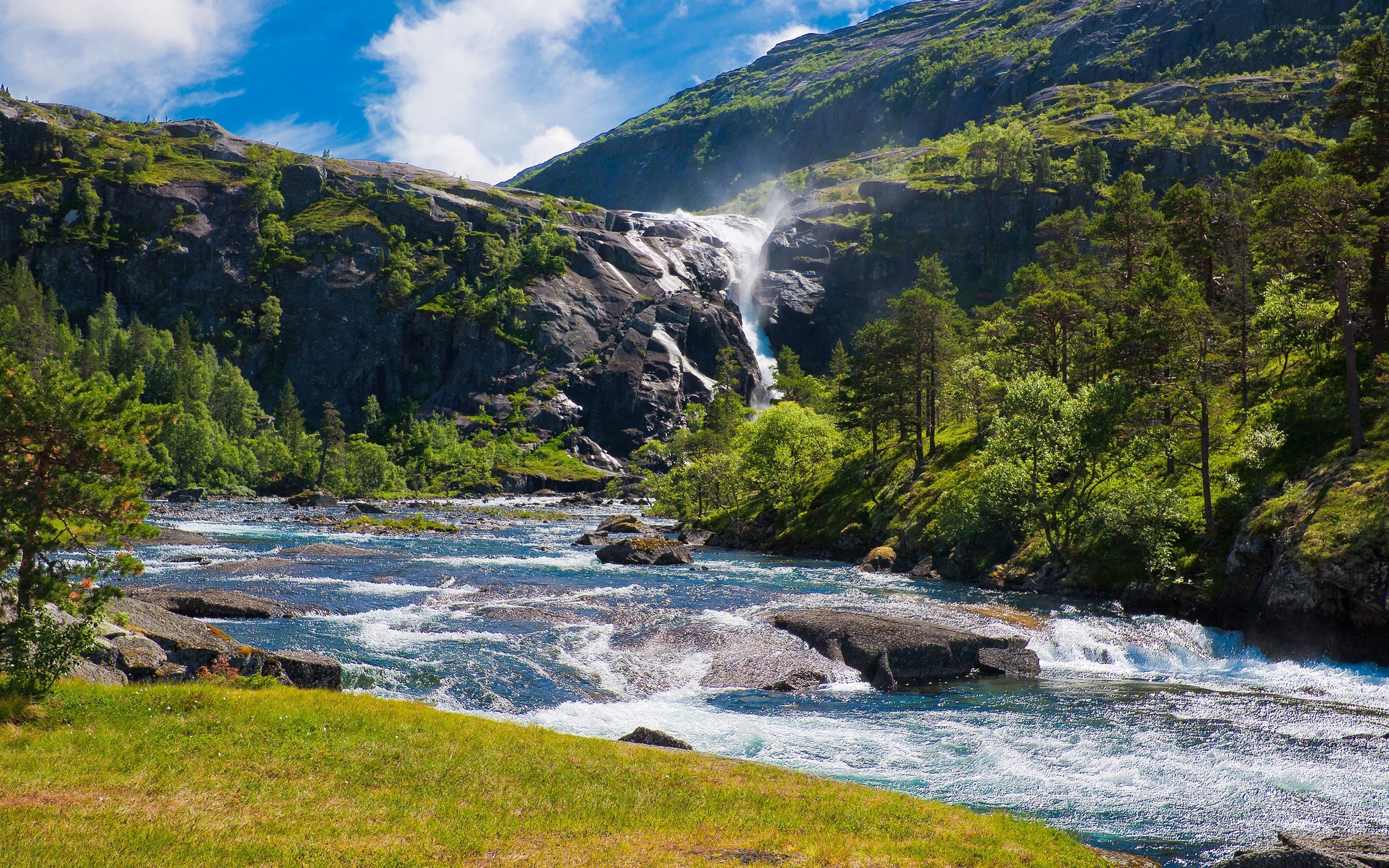 Waterfall in a mountain valley