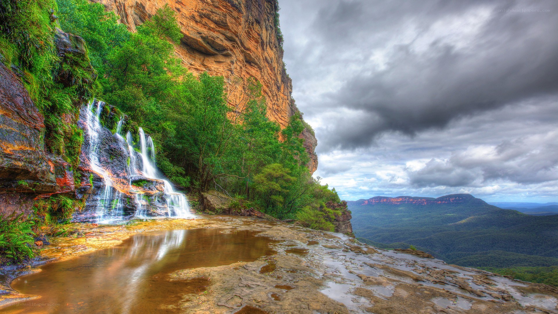 Waterfall in a mountain valley