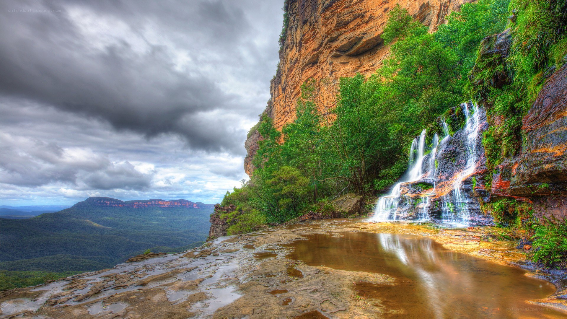 Waterfall in a mountain valley