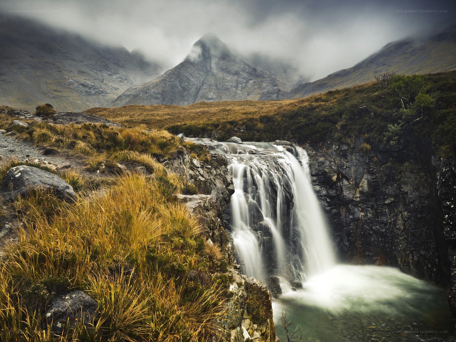 Waterfall in a mountain valley