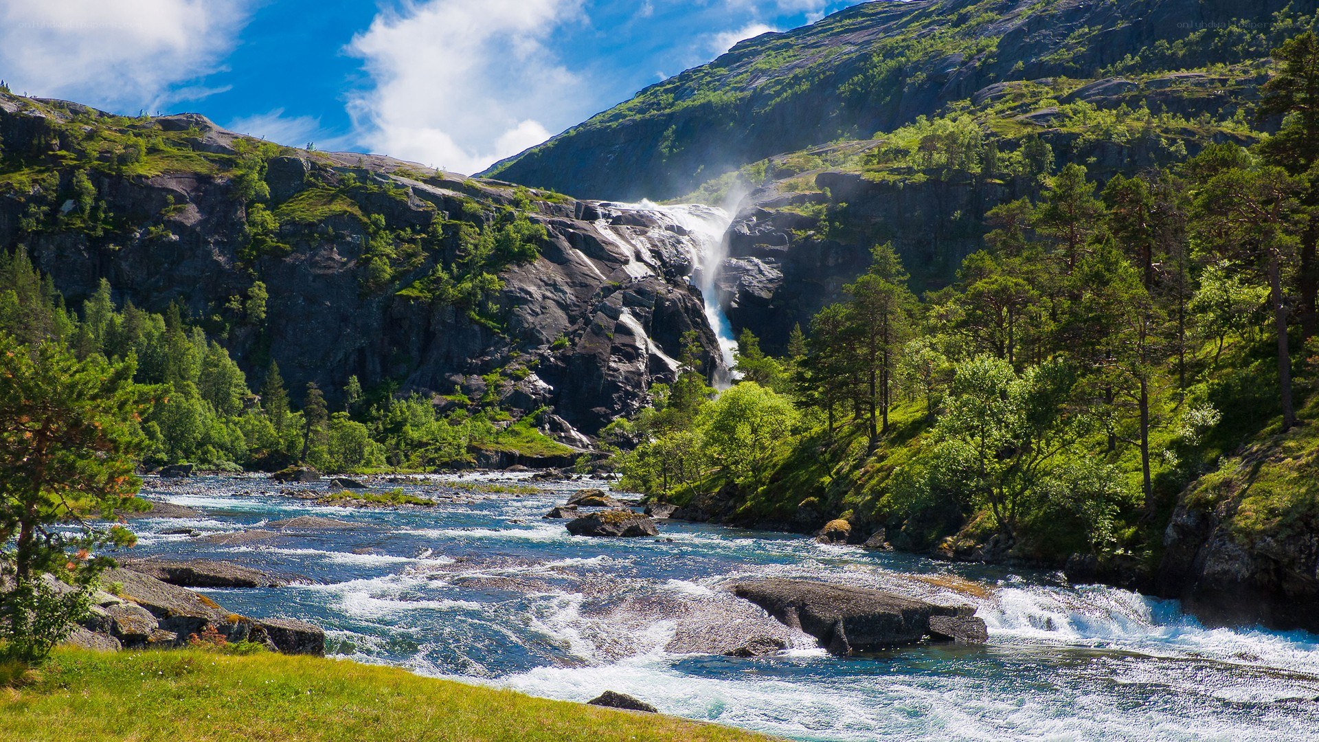 Waterfall in a mountain valley