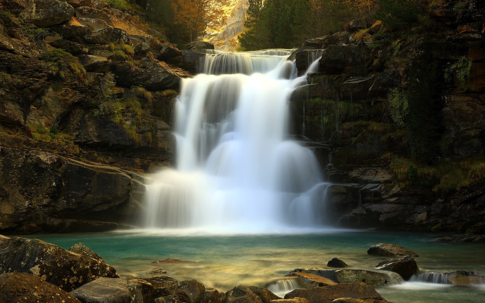 Waterfall in a mountain valley