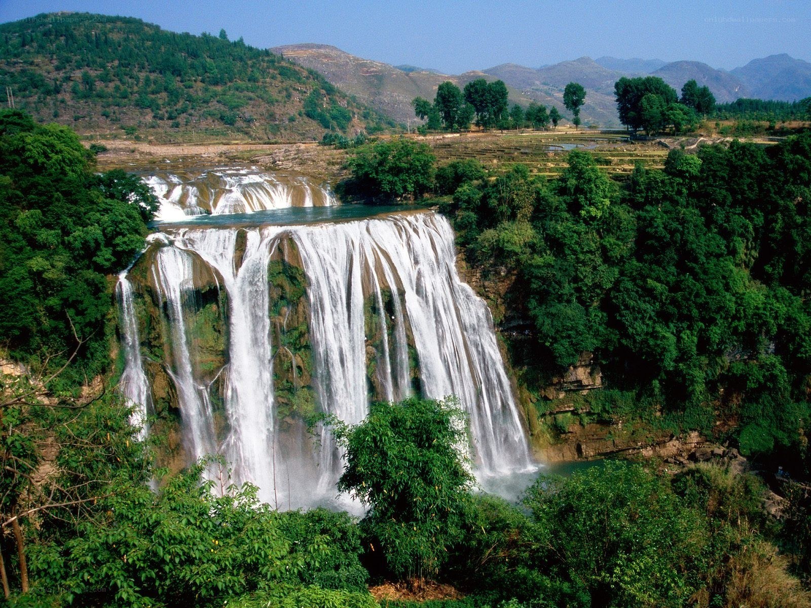 Waterfall in a mountainous landscape