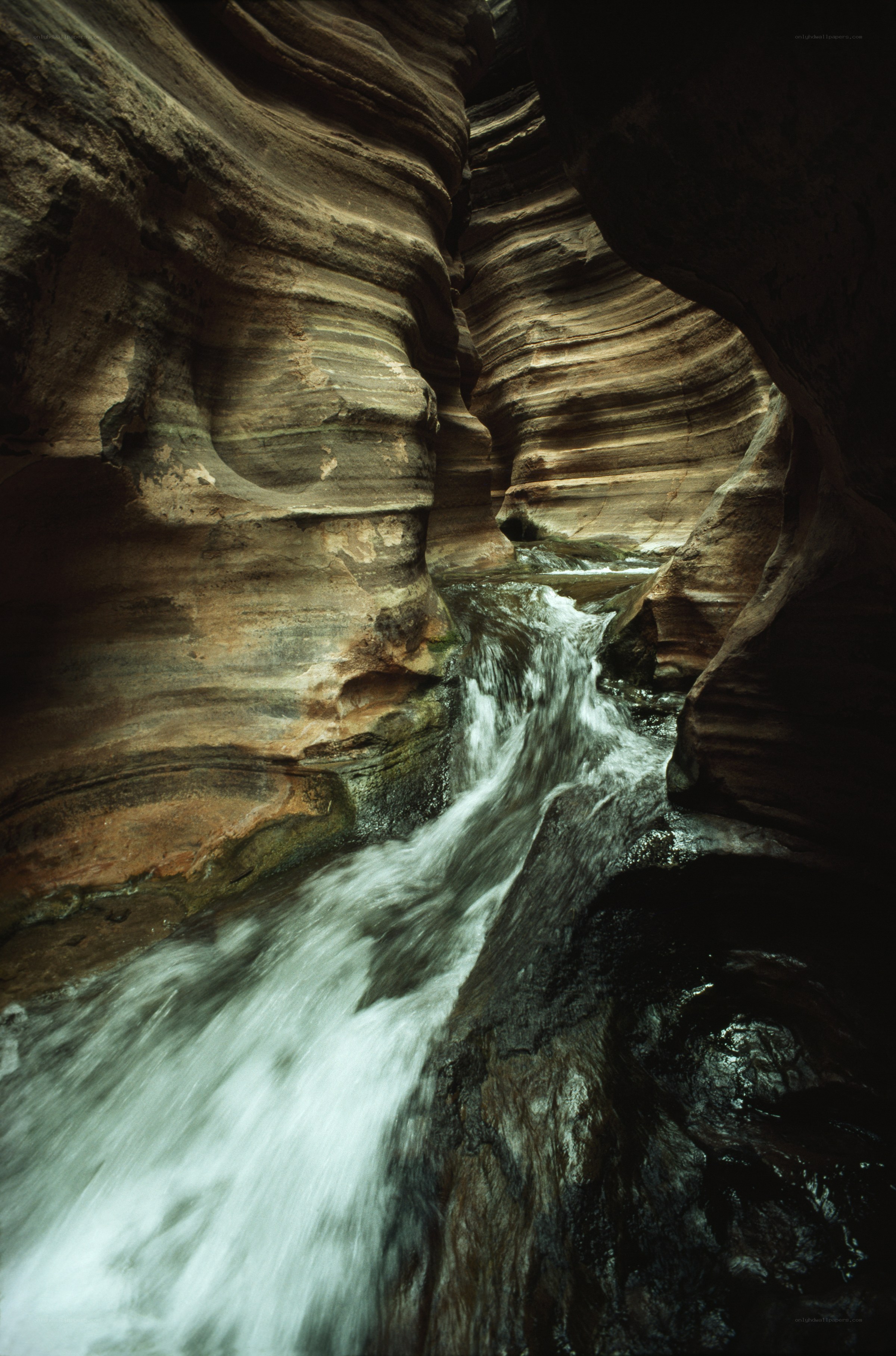 Waterfall in a narrow canyon