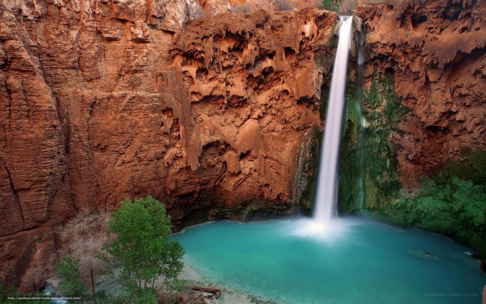 Waterfall in a red canyon