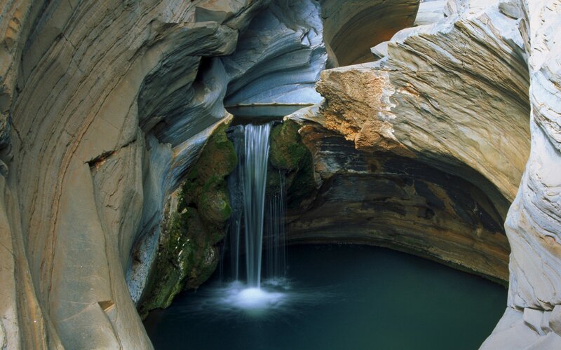 Waterfall in a rock cave