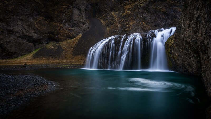 Waterfall in a rocky canyon