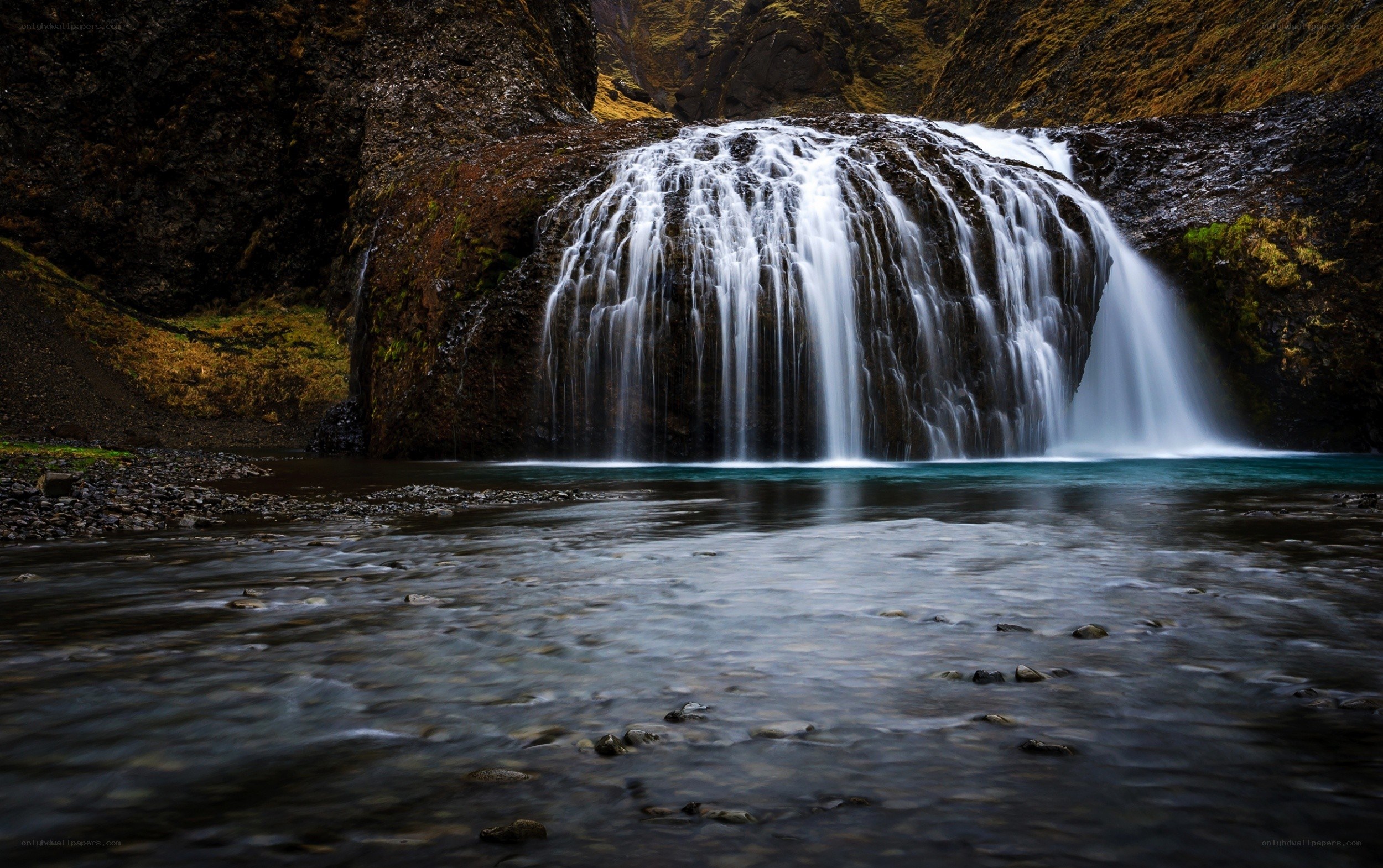 Waterfall in a rocky canyon