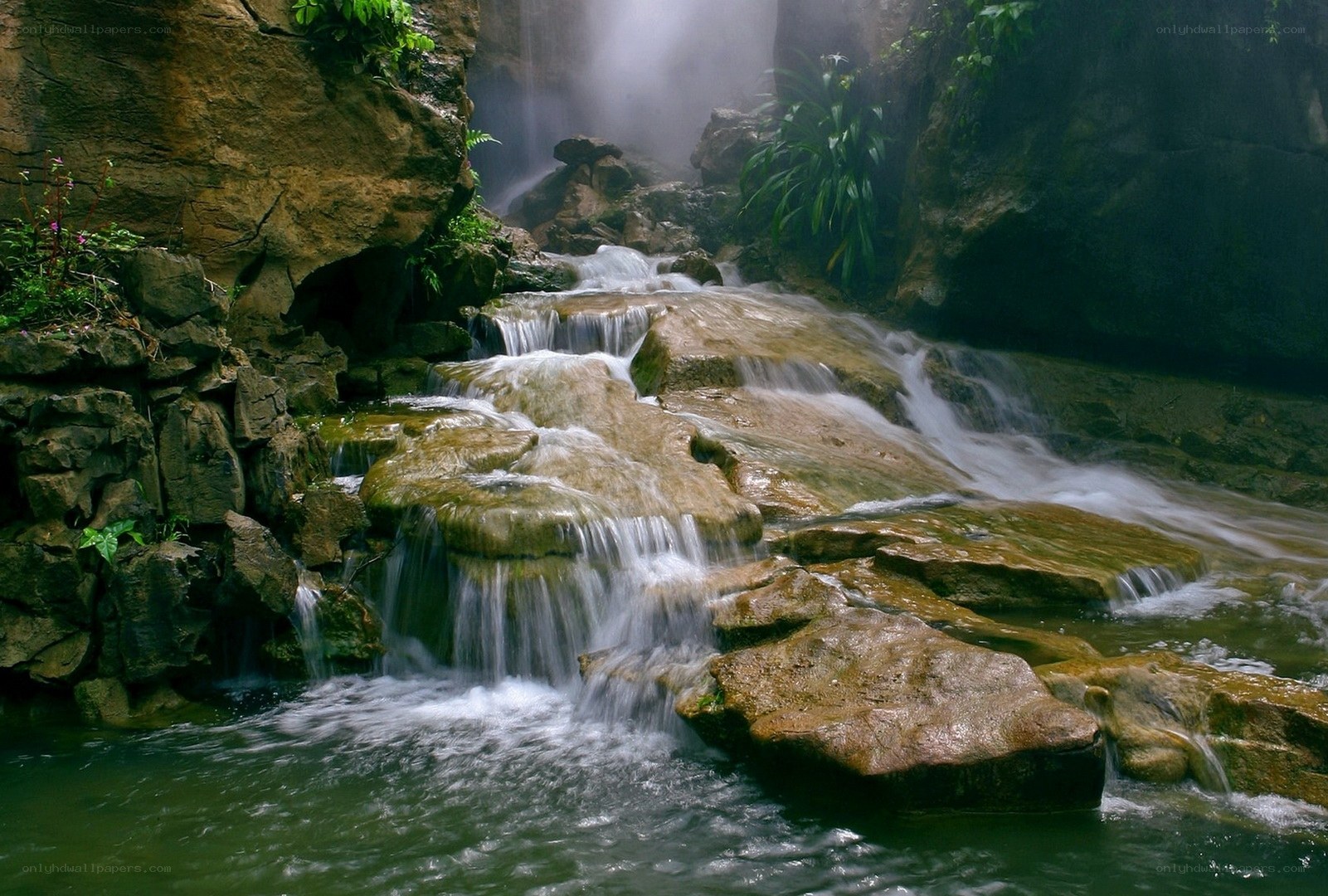 Waterfall in a rocky canyon
