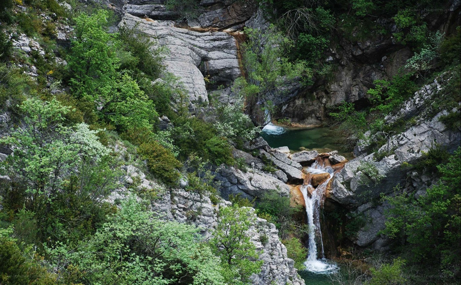 Waterfall in a rocky canyon