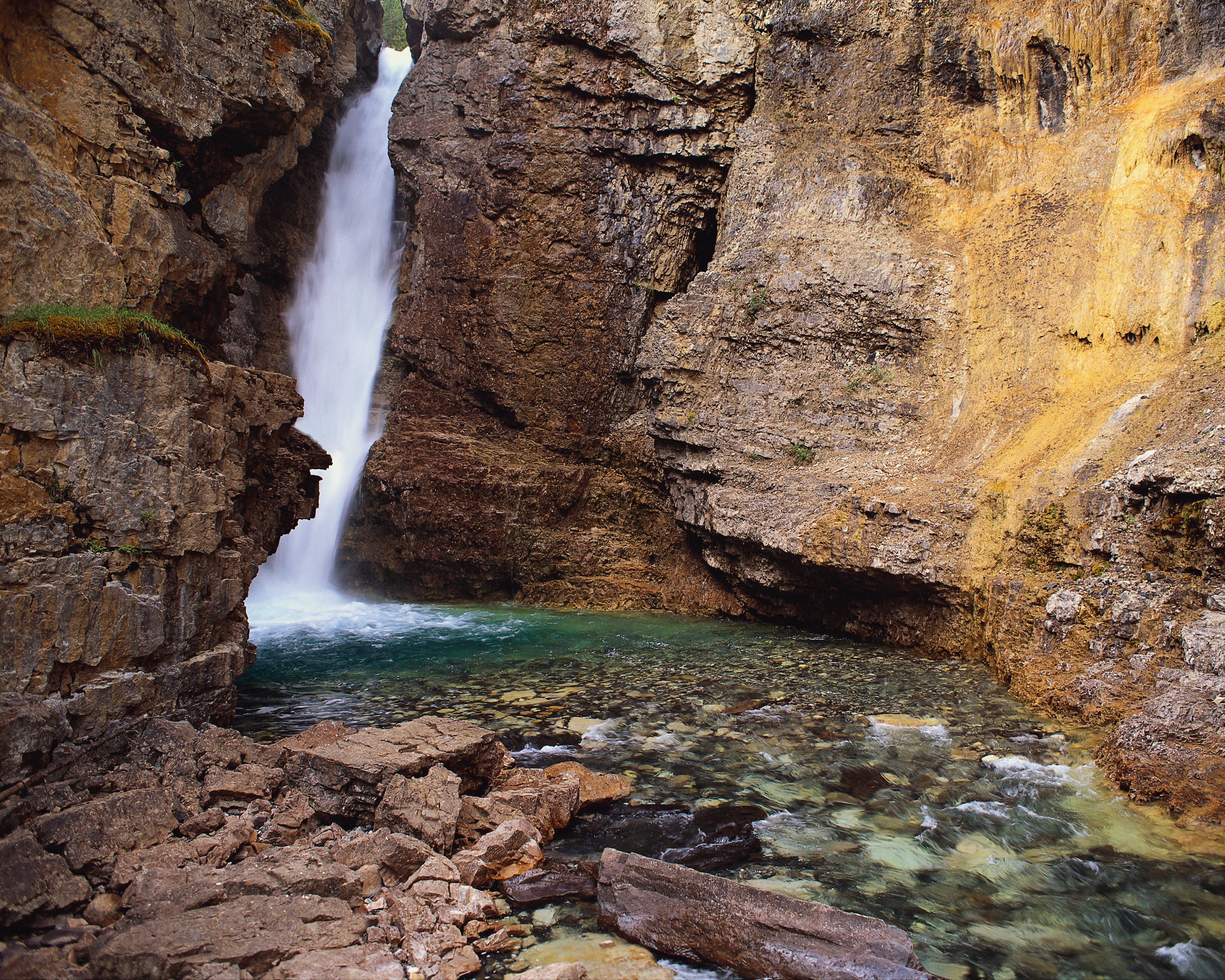 Waterfall in a rocky canyon