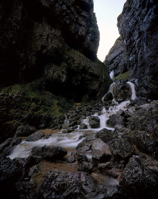 Waterfall in a rocky canyon