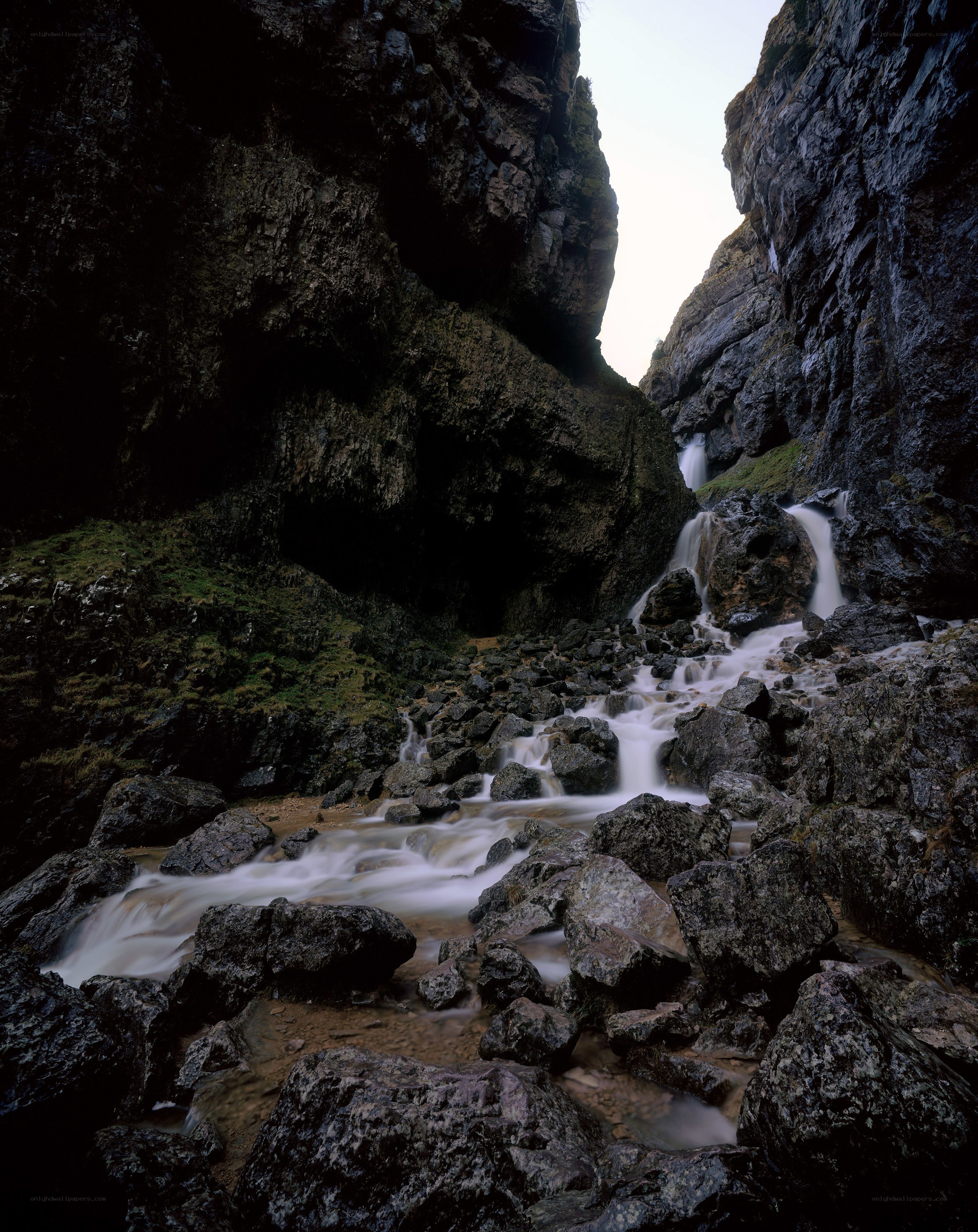 Waterfall in a rocky canyon
