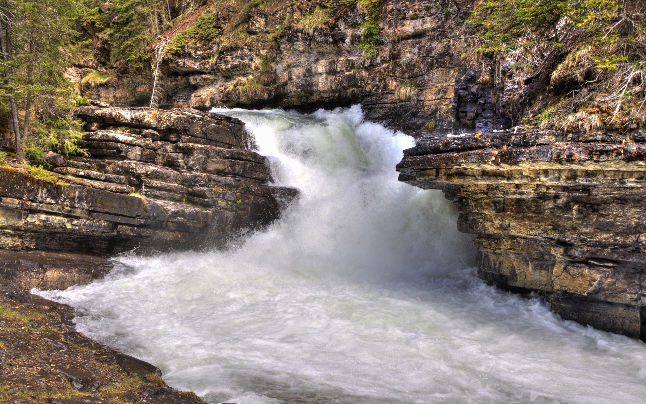 Waterfall in a rocky canyon