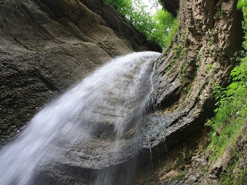 Waterfall in a rocky canyon