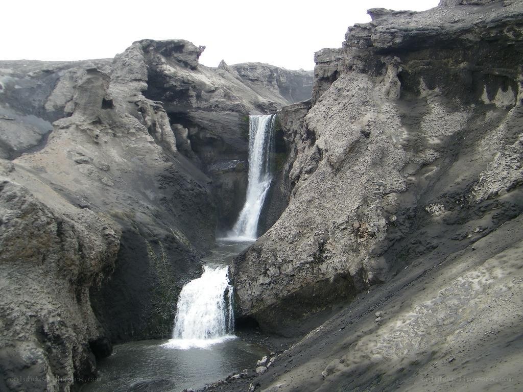 Waterfall in a rocky canyon