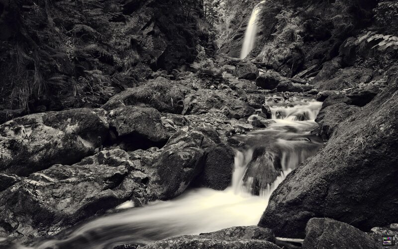 Waterfall in a rocky forest
