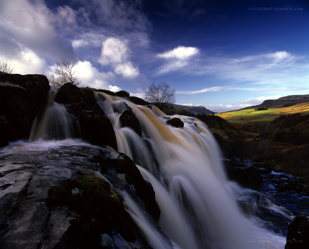 Waterfall in a scenic valley