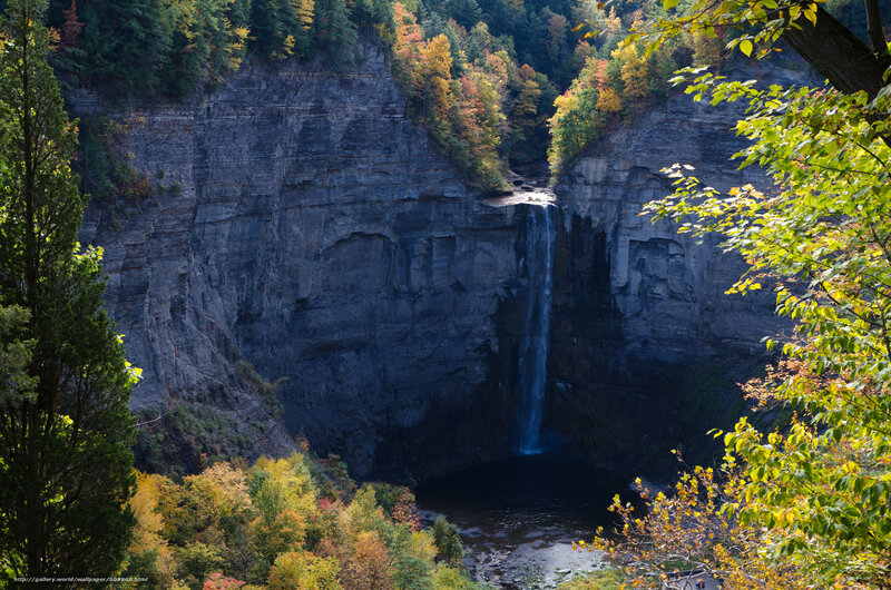 Waterfall in autumn canyon