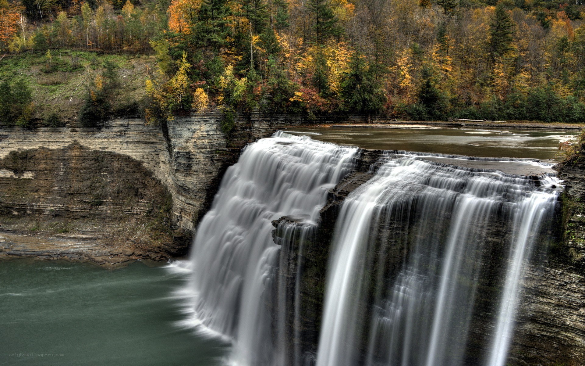 Waterfall in autumn forest