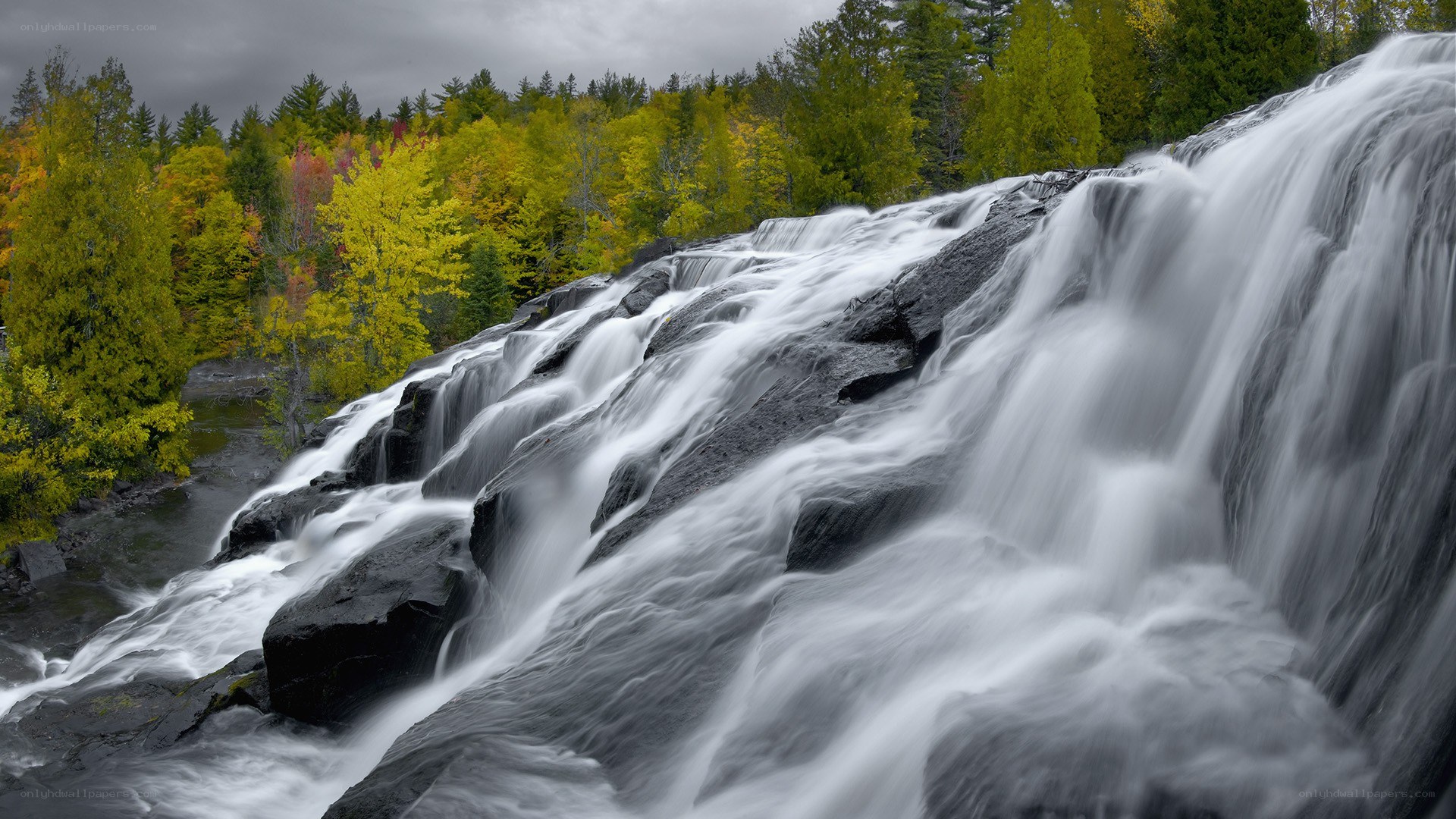 Waterfall in autumn forest