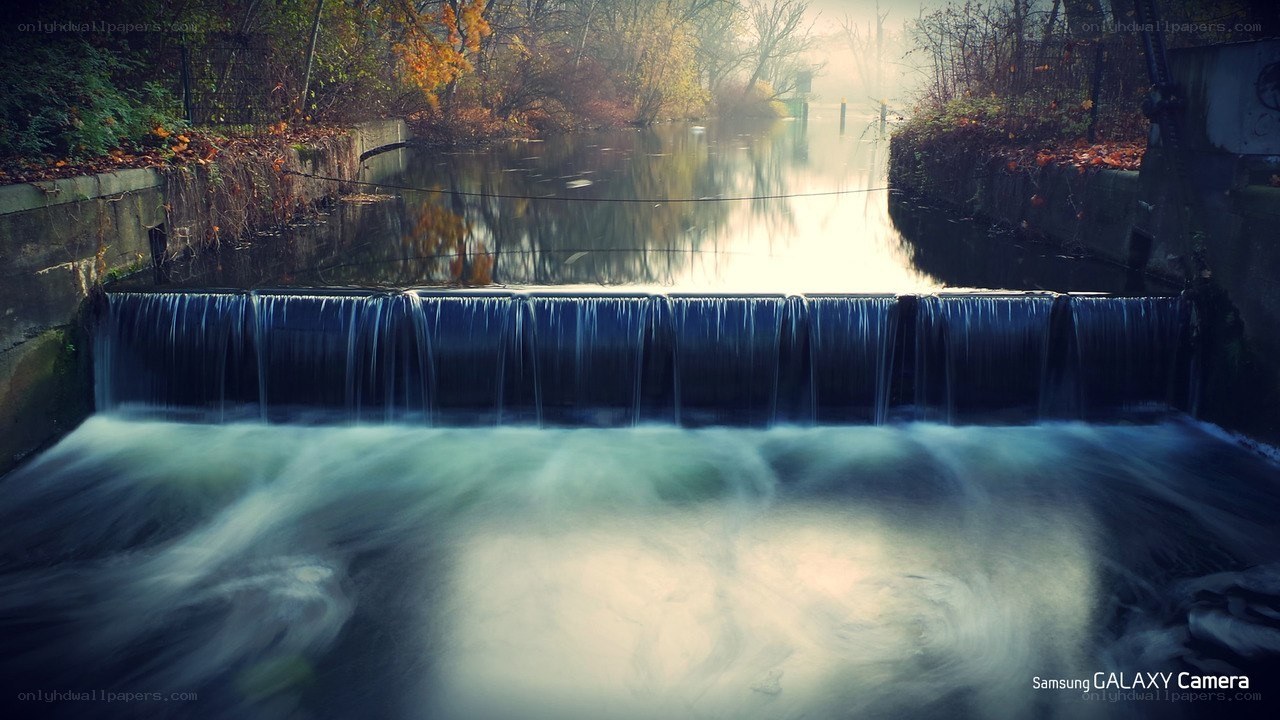 Waterfall in autumn forest