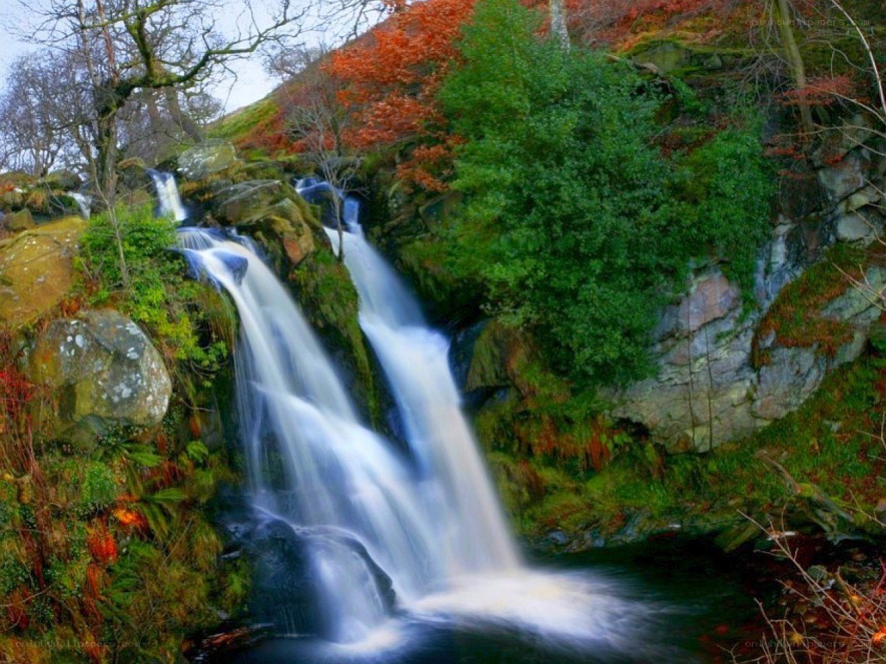 Waterfall in autumn forest