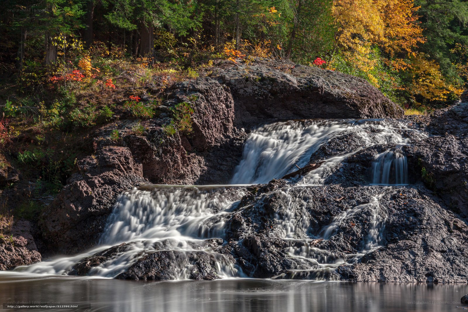Waterfall in autumn forest