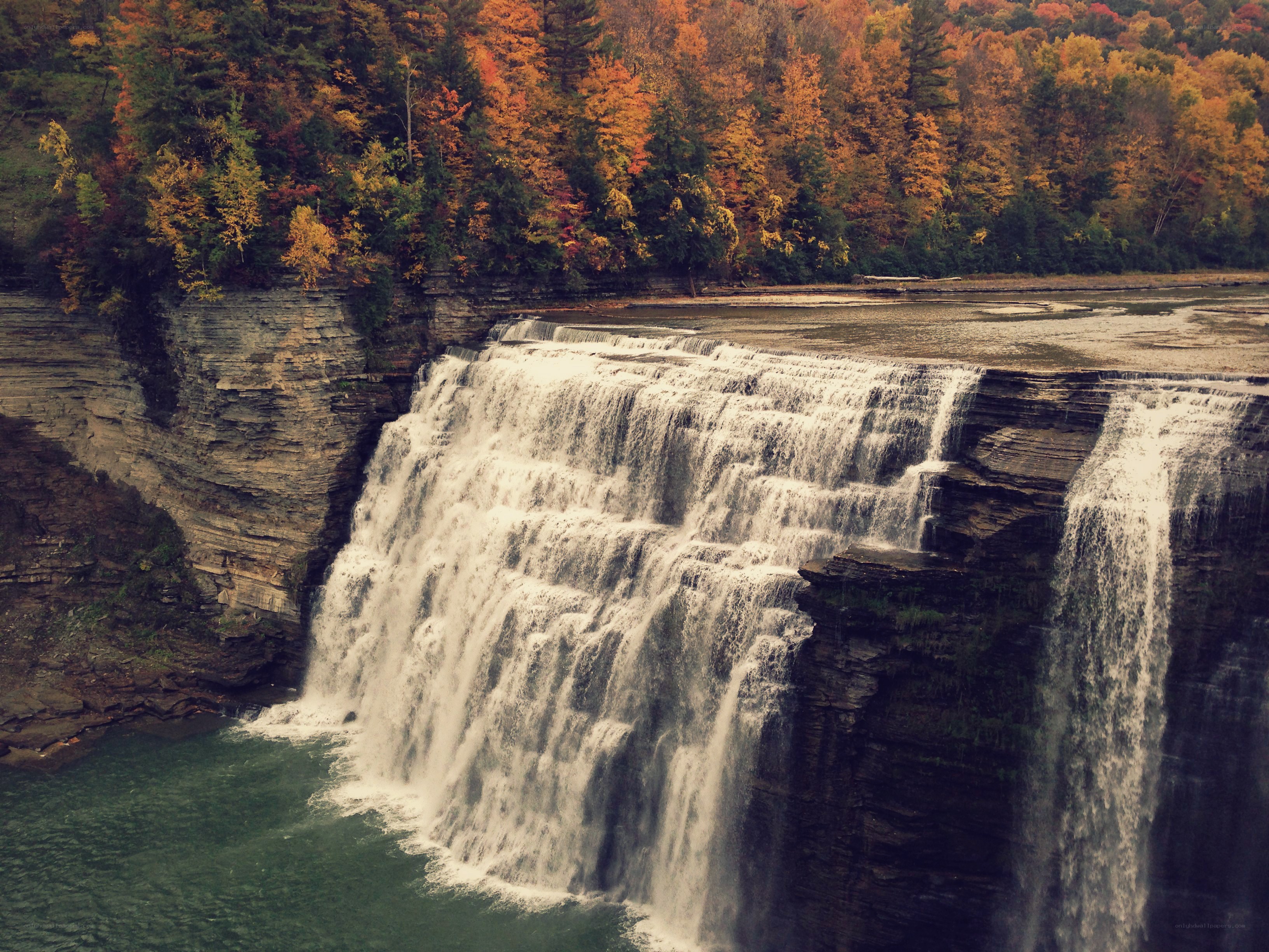 Waterfall in autumn forest