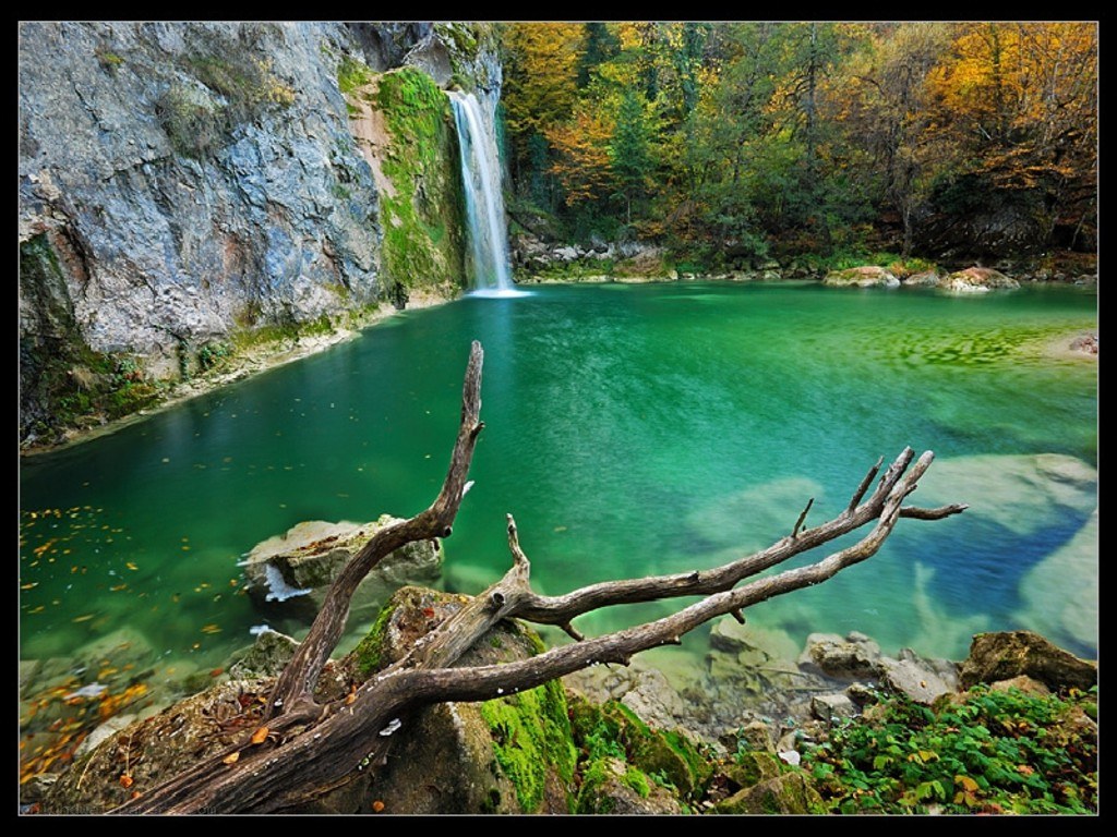 Waterfall in autumn forest