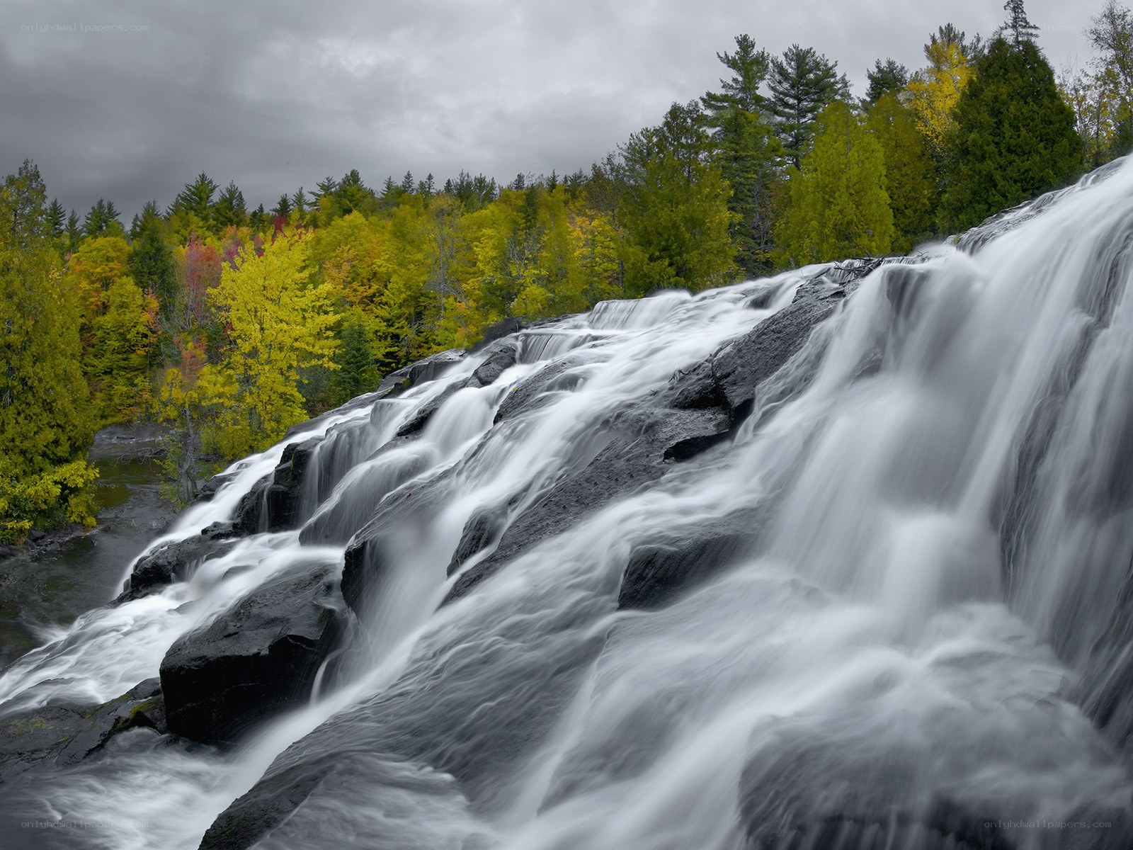 Waterfall in autumn forest
