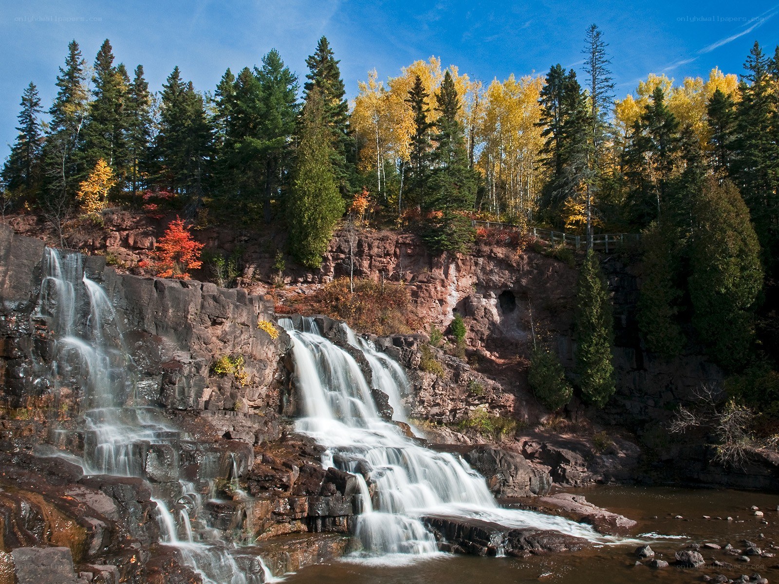 Waterfall in autumn forest