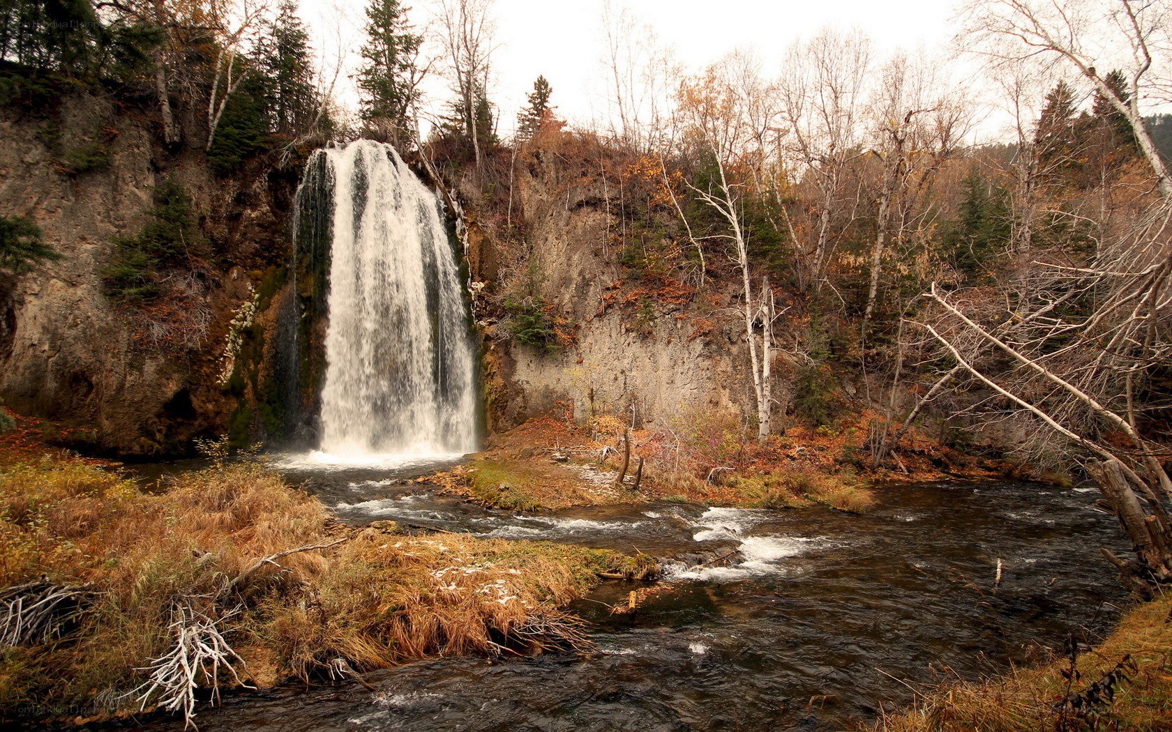 Waterfall in autumn forest