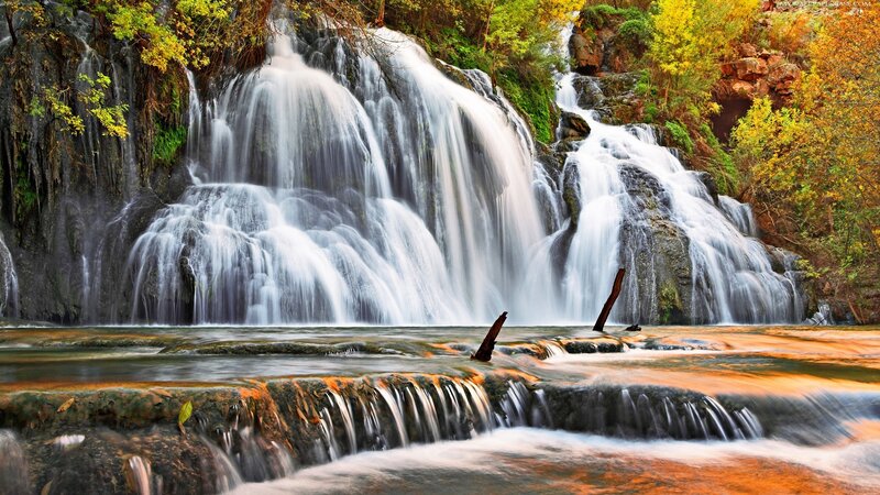 Waterfall in Autumn Forest — Green, Serene