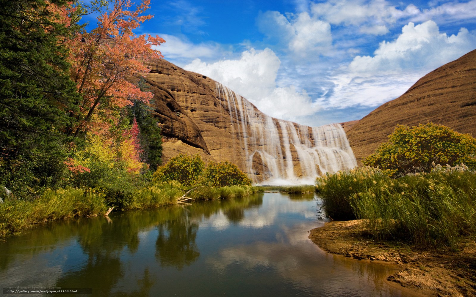 Waterfall in autumn landscape
