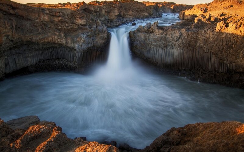 Waterfall in basalt canyon