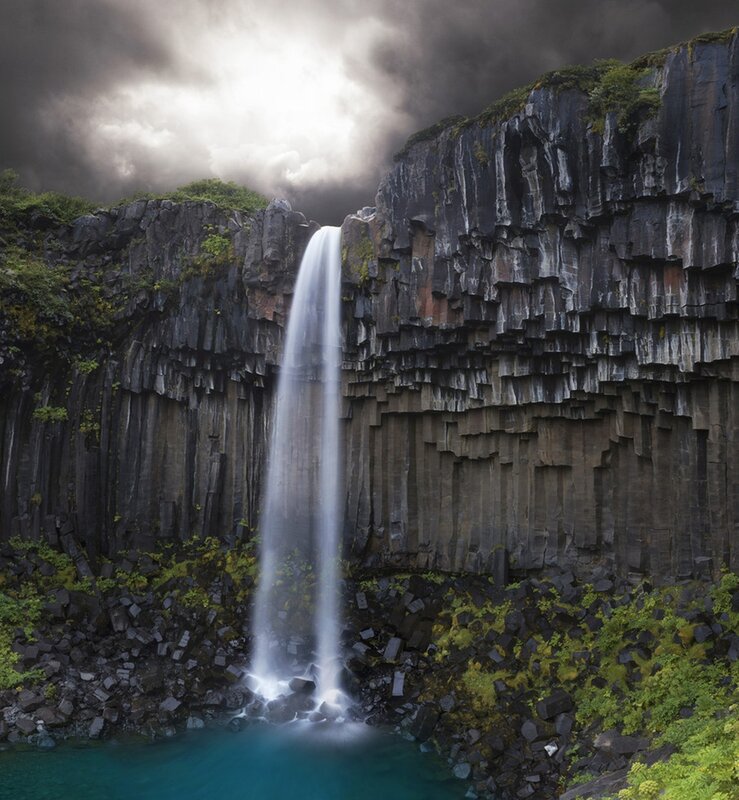 Waterfall in Basalt Cliffs — Black, Dramatic, Photograph, Pool, Clouds