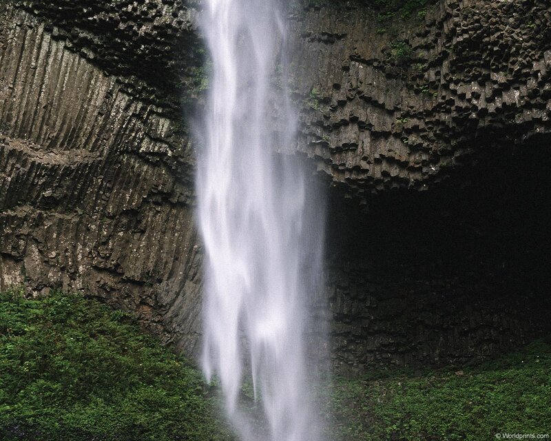 Waterfall in basalt cliffs