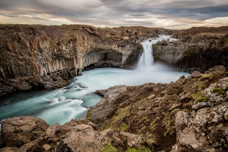 Waterfall in Canyon — Blue, Dramatic, Afternoon, Photograph, River, Clouds, Rocks