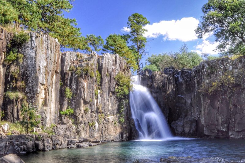 Waterfall in Canyon — Blue, Serene, Afternoon, Photograph, Cliffs