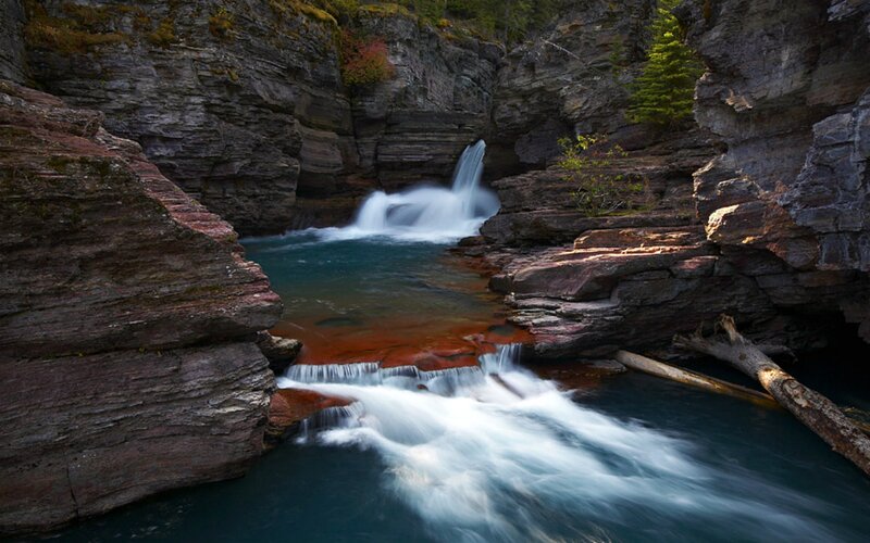 Waterfall in Canyon — Blue, Serene, Afternoon, Photograph, River, Trees, Rocks