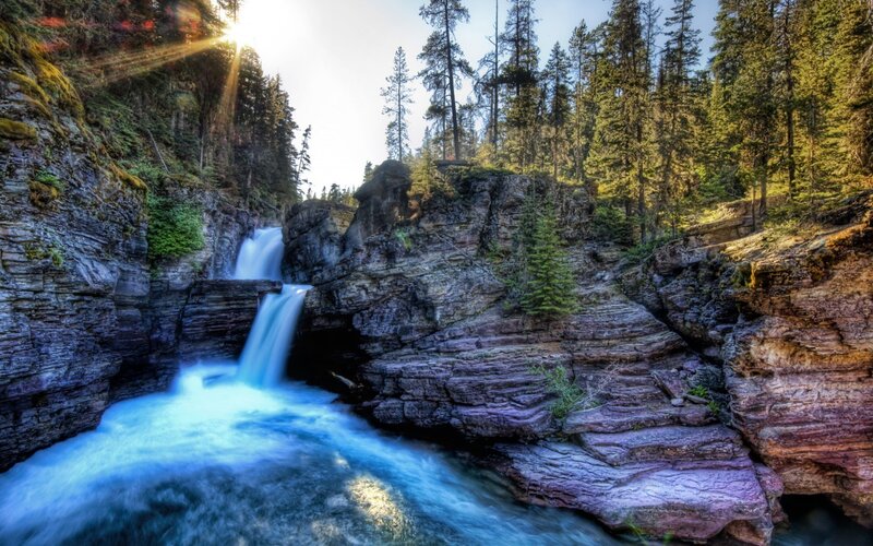 Waterfall in Canyon — Blue, Serene, Afternoon, Photograph, Trees, Rocks, Sunlight